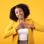 Young women showing thanks for thankful quotes